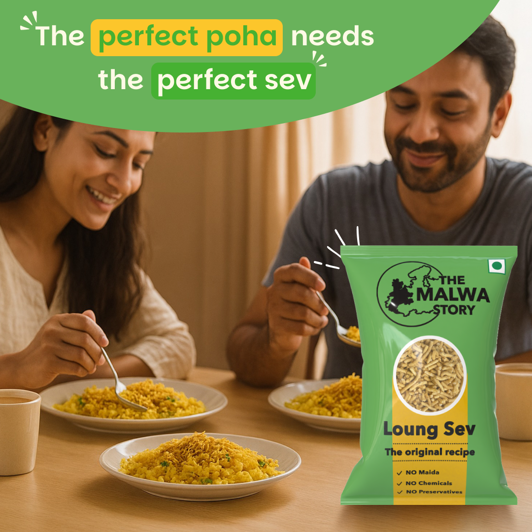 Two people enjoying a meal with a package of 'The Malwa Story' Loung Sev in the foreground.