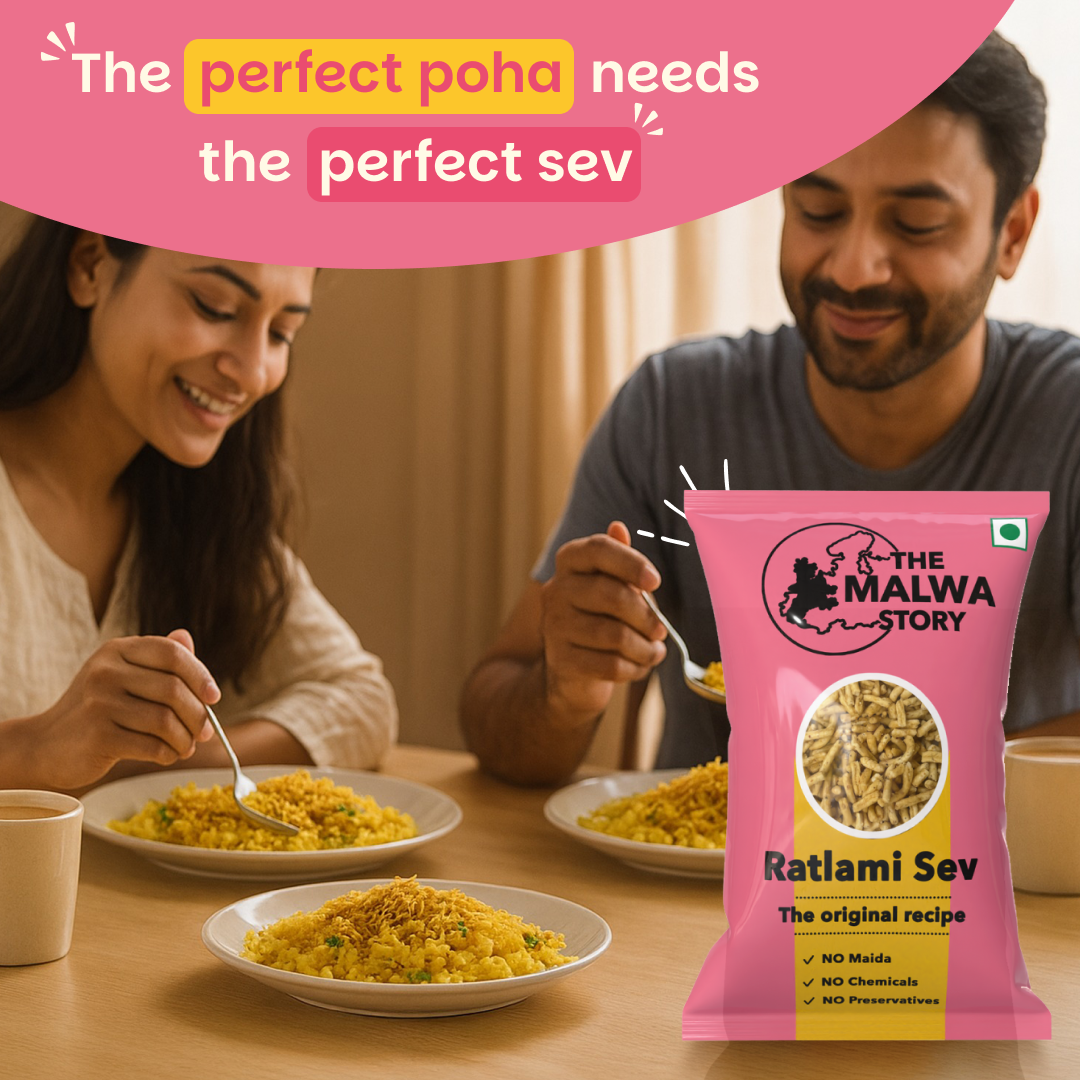 Couple enjoying food with a pink 'The Malwa Story' Ratlami Sev package in the foreground.